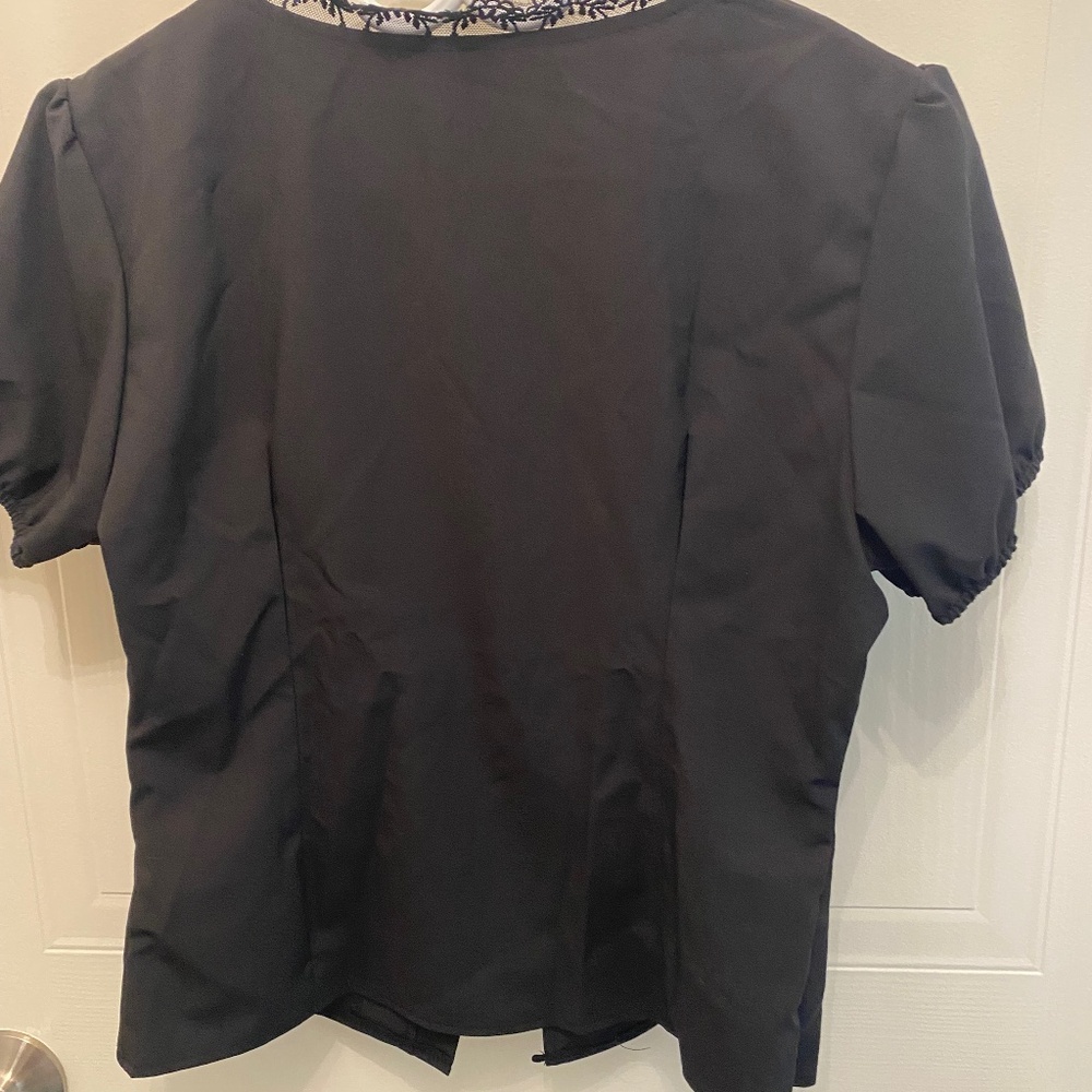 Boho blouse with lace and buttons in front. Never worn.